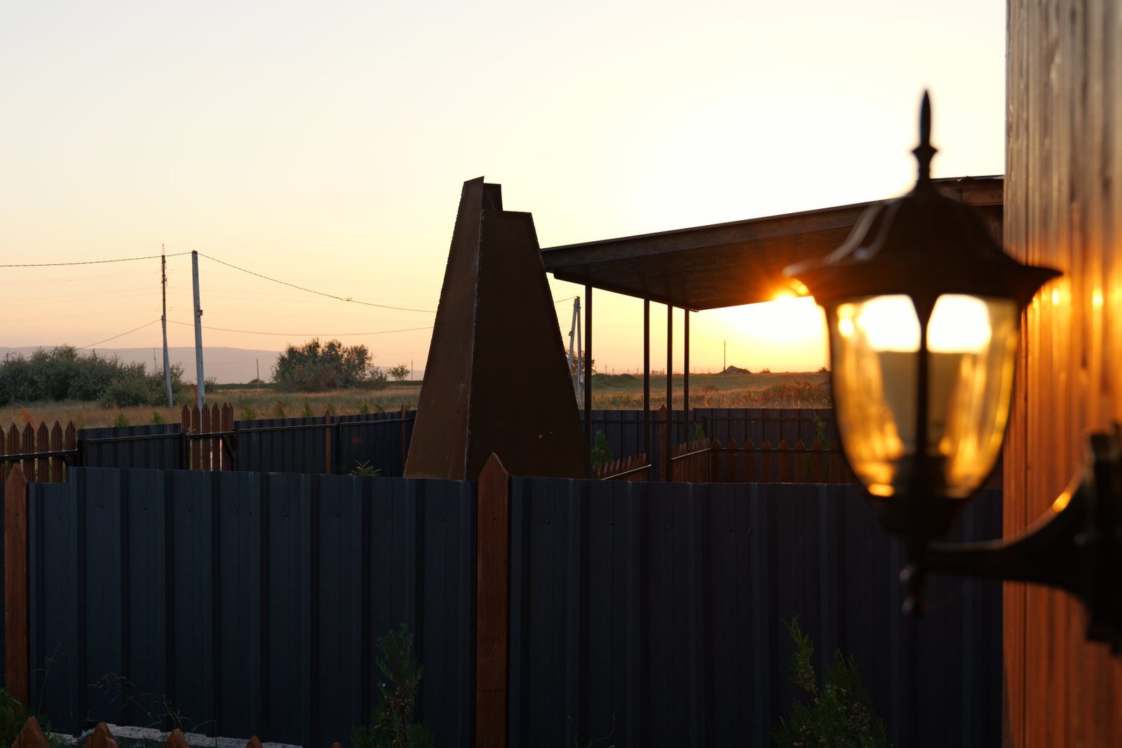 Sunset over private cabin yards at Sky Cabins Ranch in Gamarjveba near Tbilisi